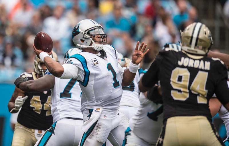 Carolina Panthers quarterback Cam Newton makes a pass.